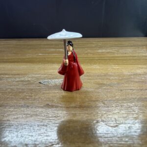 Feamle with an umbrella decor.